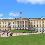 Royal Palace in Oslo Norway with gardens and visitors