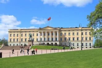 Royal Palace in Oslo Norway with gardens and visitors
