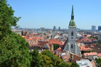 Panoramic view of Bratislava city centre with St Martin’s Cathedral and red rooftops in Slovakia