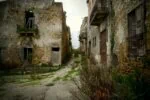 Abandoned earthquake damaged street in Poggioreale Vecchia ghost town in western Sicily.