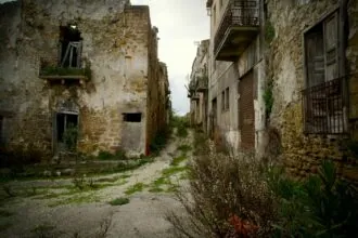 Abandoned earthquake damaged street in Poggioreale Vecchia ghost town in western Sicily.