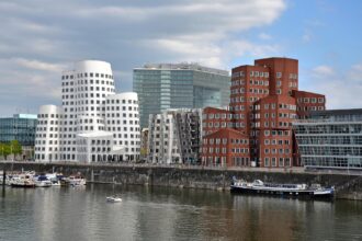 Düsseldorf MedienHafen skyline with modern buildings along the river