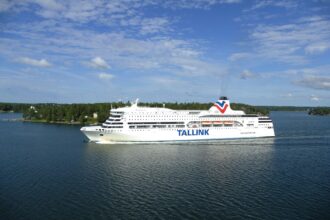 Tallink ferry sailing through the Finnish Archipelago near Turku under blue summer skies