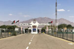 Jordan border crossing near Aqaba with Welcome to Jordan gateway and desert mountains