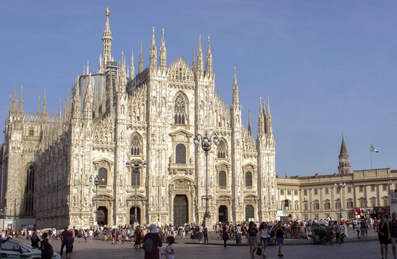 Milan Duomo cathedral in Piazza del Duomo with visitors