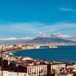 View across Naples and the Bay of Naples with Mount Vesuvius behind the city skyline