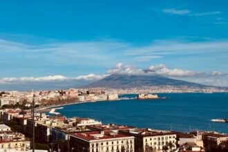 View across Naples and the Bay of Naples with Mount Vesuvius behind the city skyline