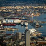 Aerial view of the Port of Naples with large GNV ferries and passenger ships preparing for overnight sailings to Sicily