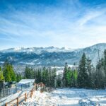 Poland vs Alps skiing comparison showing different mountain terrain and ski conditions