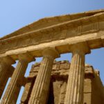 Ancient Greek Doric temple columns at the Valley of the Temples UNESCO site in Agrigento, Sicily.