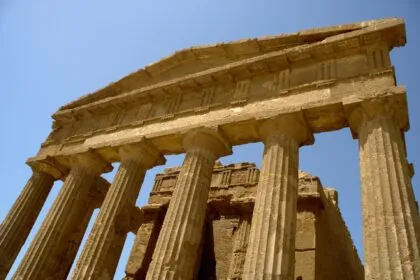 Ancient Greek Doric temple columns at the Valley of the Temples UNESCO site in Agrigento, Sicily.
