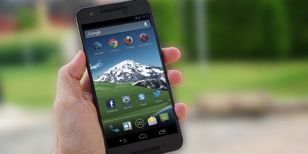 Smartphone displaying travel apps and mobile connectivity services