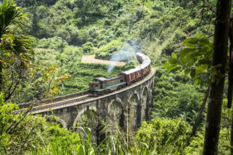 Coastal skyline and railway travel near Colombo Sri Lanka