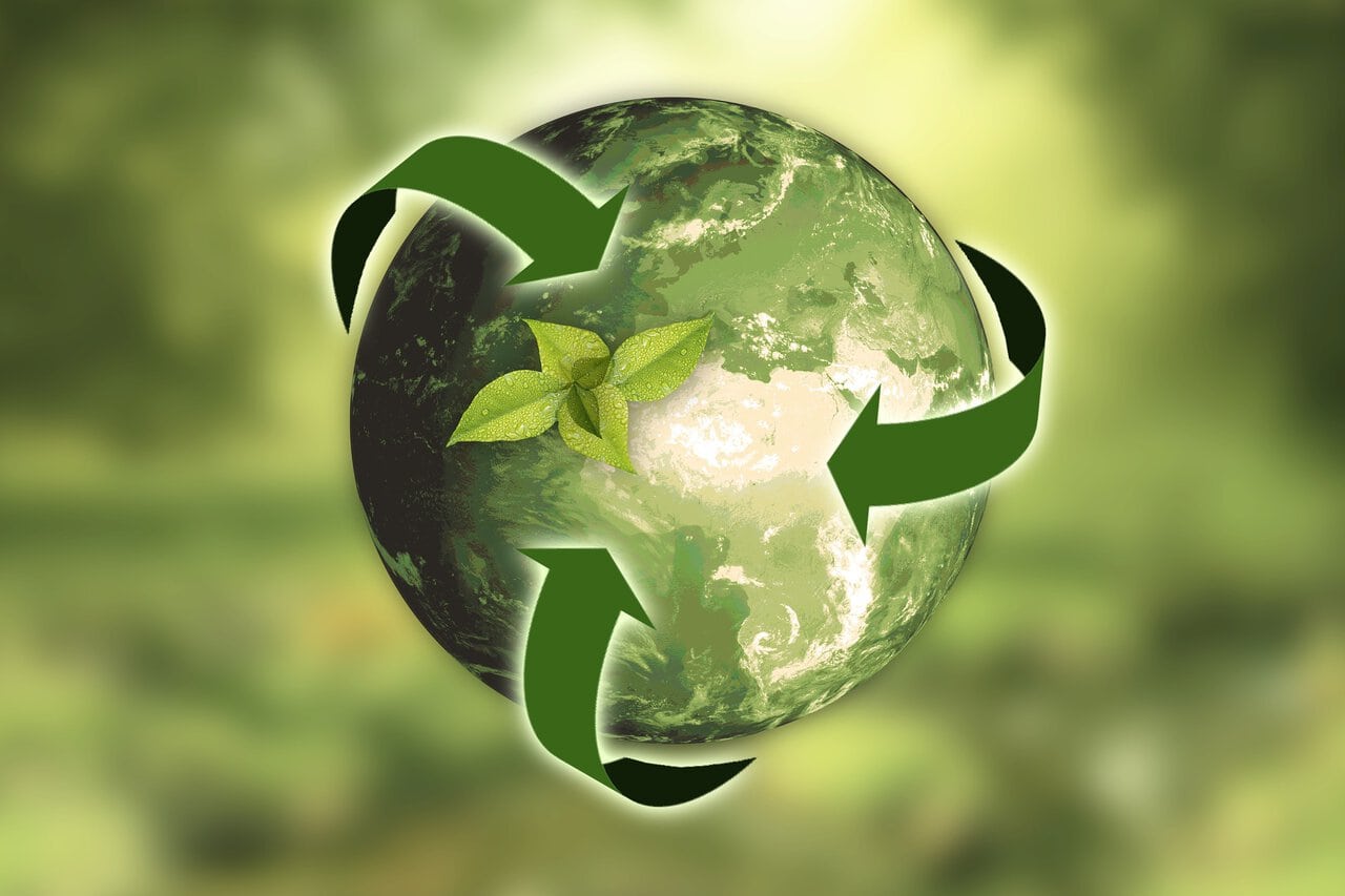 Sustainable travel concept showing Earth with green arrows and eco-friendly cycle