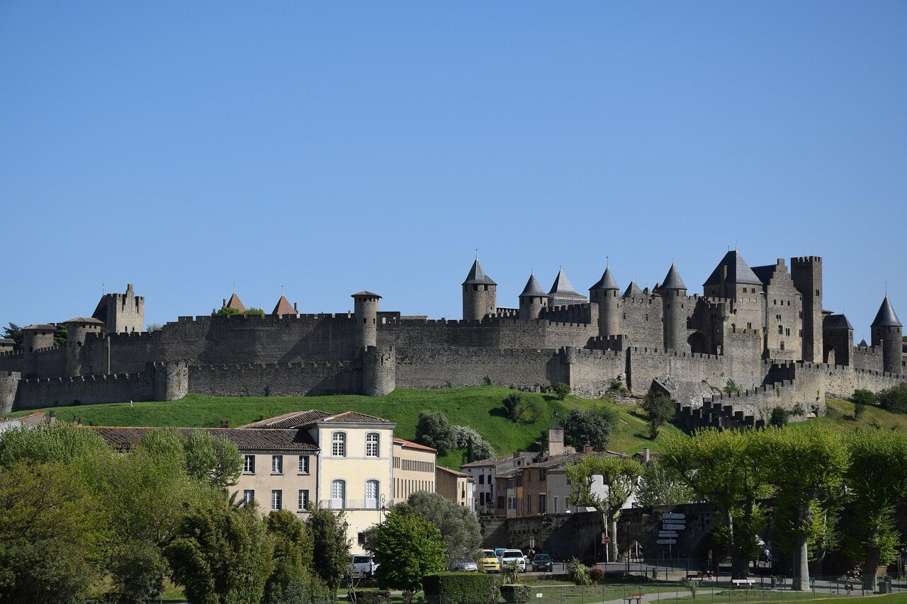 View of the medieval fortified walls of Carcassonne reached by train from Toulouse in southern France.