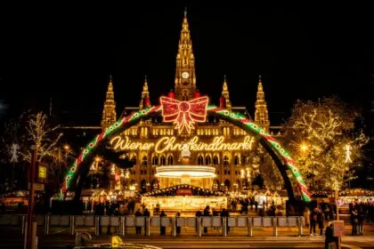 Vienna Christmas Market illuminated at night in front of Vienna City Hall during the festive season