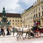 Horse-drawn carriage outside the Hofburg Palace in UNESCO-listed Vienna city centre