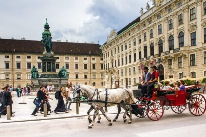 Horse-drawn carriage outside the Hofburg Palace in UNESCO-listed Vienna city centre