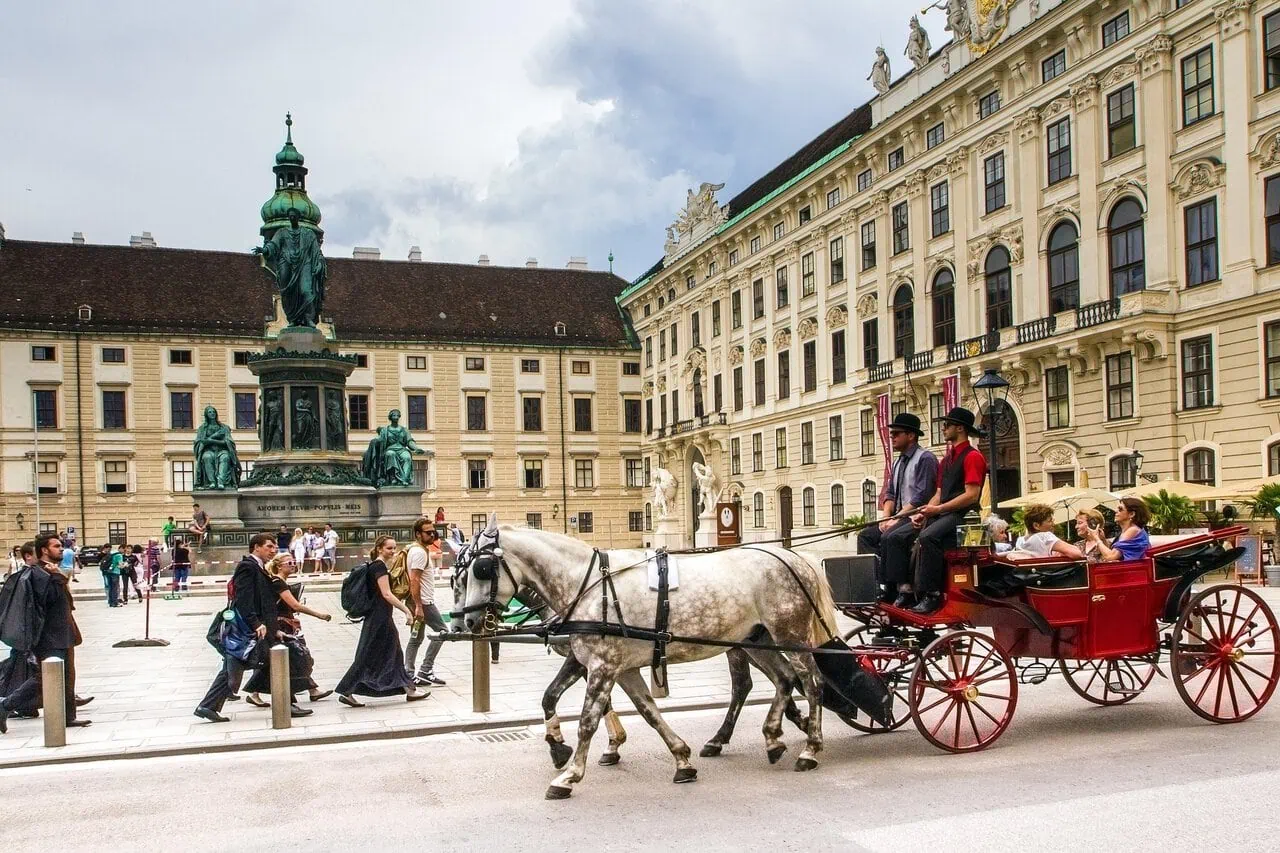 Horse-drawn carriage outside the Hofburg Palace in UNESCO-listed Vienna city centre