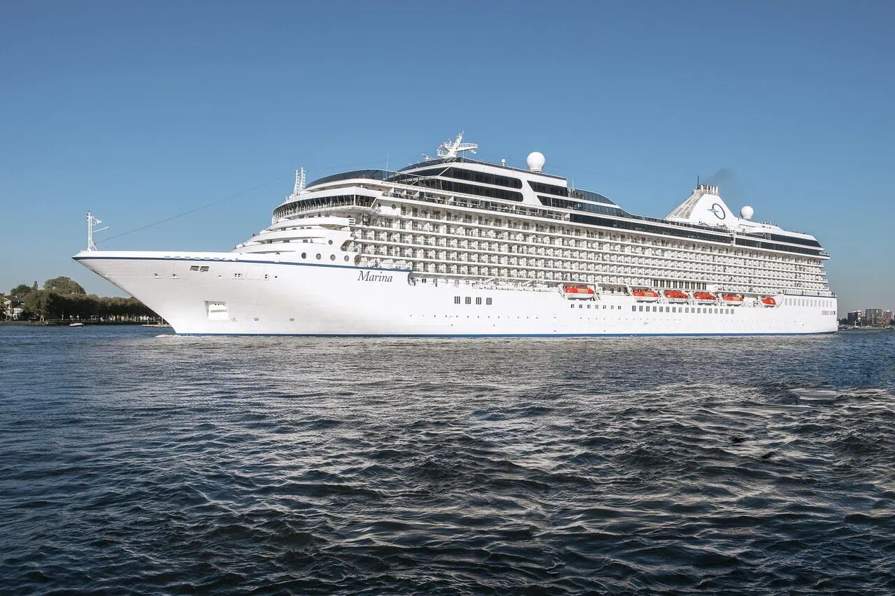 Ocean cruise ship sailing from Amsterdam Cruise Port near Passenger Terminal Amsterdam
