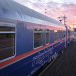 Nightjet sleeper train from Amsterdam travelling through Europe at sunrise