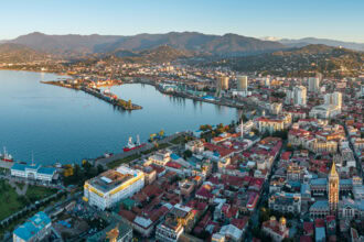 Aerial view of Batumi city centre, Black Sea coastline and mountains in Georgia