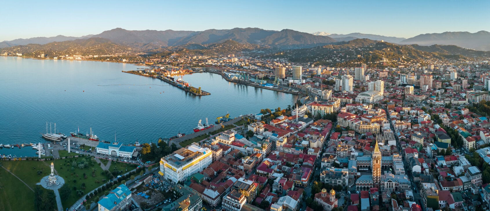 Aerial view of Batumi city centre, Black Sea coastline and mountains in Georgia