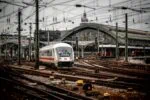 Deutsche Bahn train arriving at Cologne Central Station, the main rail hub connecting Cologne Bonn Airport with the city centre.