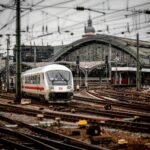 Deutsche Bahn train arriving at Cologne Central Station, the main rail hub connecting Cologne Bonn Airport with the city centre.