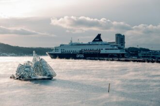 DFDS ferry docked in Stockholm archipelago waters during winter