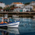 Traditional fishing boat in Tavira harbour, Algarve, Portugal.