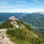 Visitors enjoying panoramic views from Eagle's Nest overlooking the Bavarian Alps near Berchtesgaden, Germany.