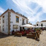 Historic buildings and cafés in Faro Old Town, Algarve, Portugal.