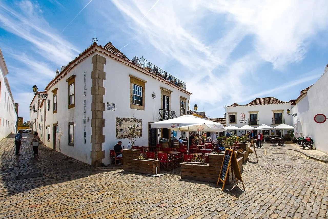 Historic buildings and cafés in Faro Old Town, Algarve, Portugal.