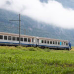 Regional train travelling through the French Alps