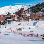 Ski lifts and slopes in the Paradiski area near Landry