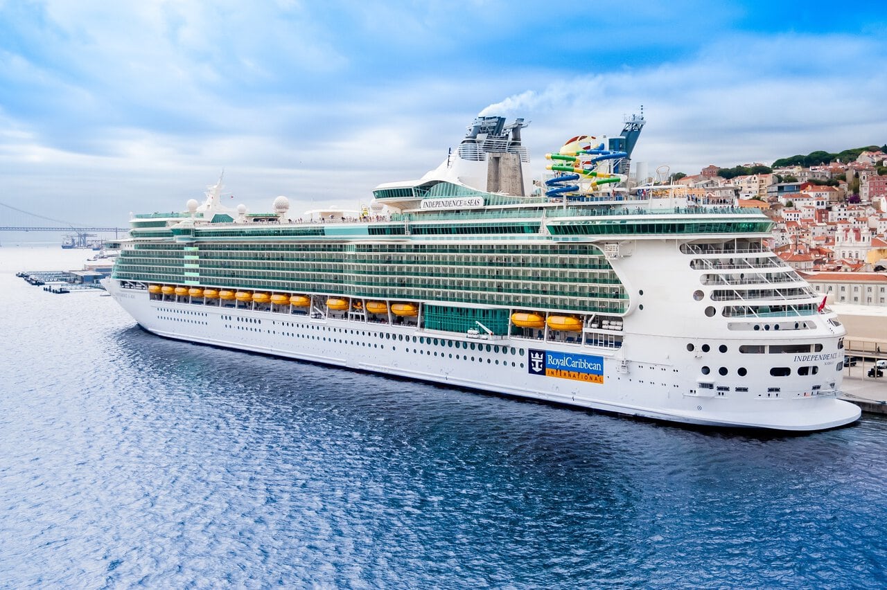 Royal Caribbean cruise ship docked at Lisbon Cruise Terminal on the Tagus River.