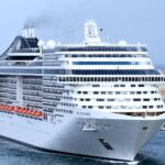 Large cruise ship entering Grand Harbour at Valletta Cruise Port in Malta