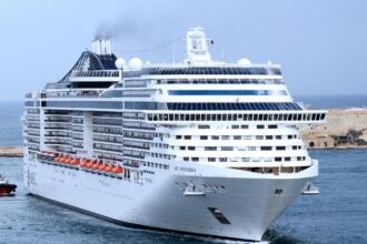 Large cruise ship entering Grand Harbour at Valletta Cruise Port in Malta