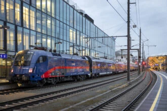 ÖBB Nightjet sleeper train standing at Salzburg Hauptbahnhof ready for an overnight departure across Europe.