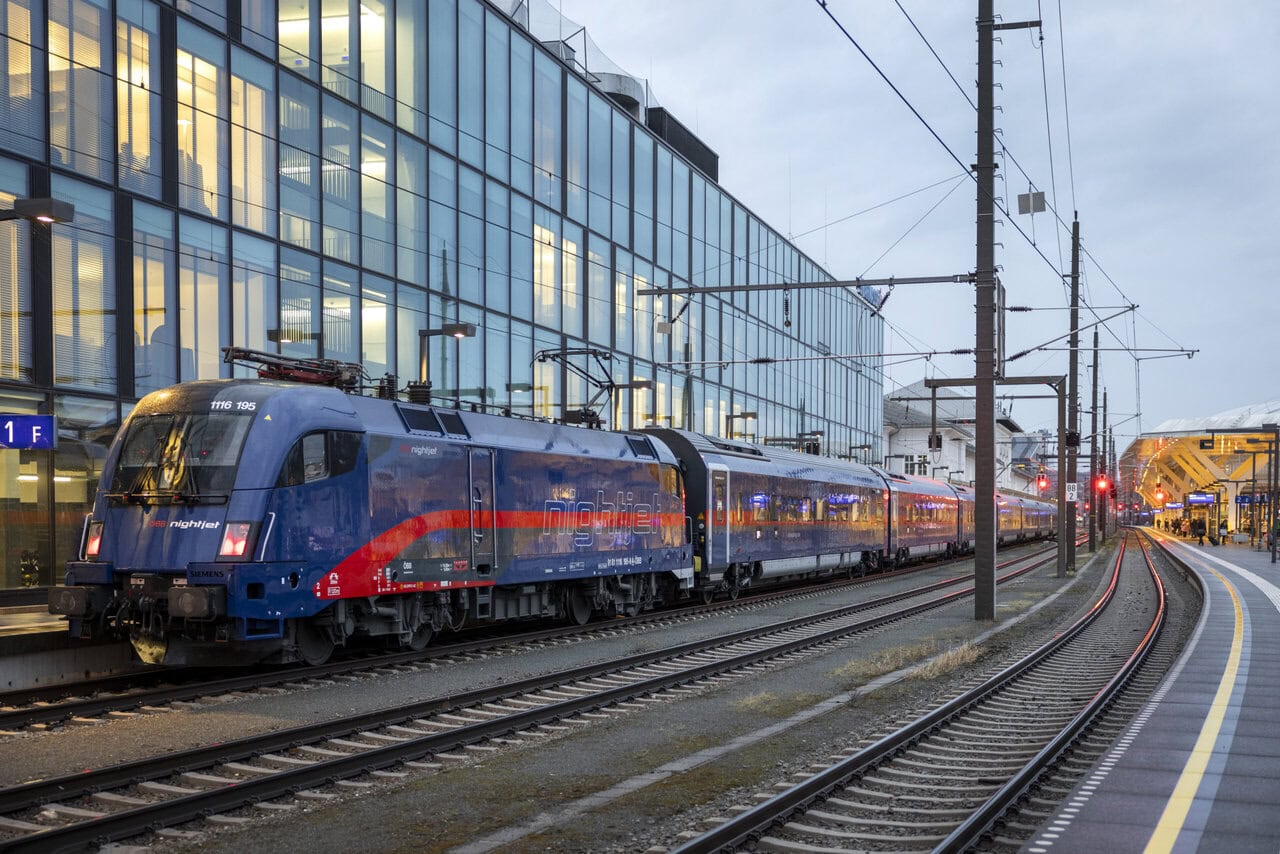 Ă–BB Nightjet sleeper train standing at Salzburg Hauptbahnhof ready for an overnight departure across Europe.