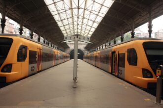 CP regional trains waiting at Porto São Bento Station in Portugal.