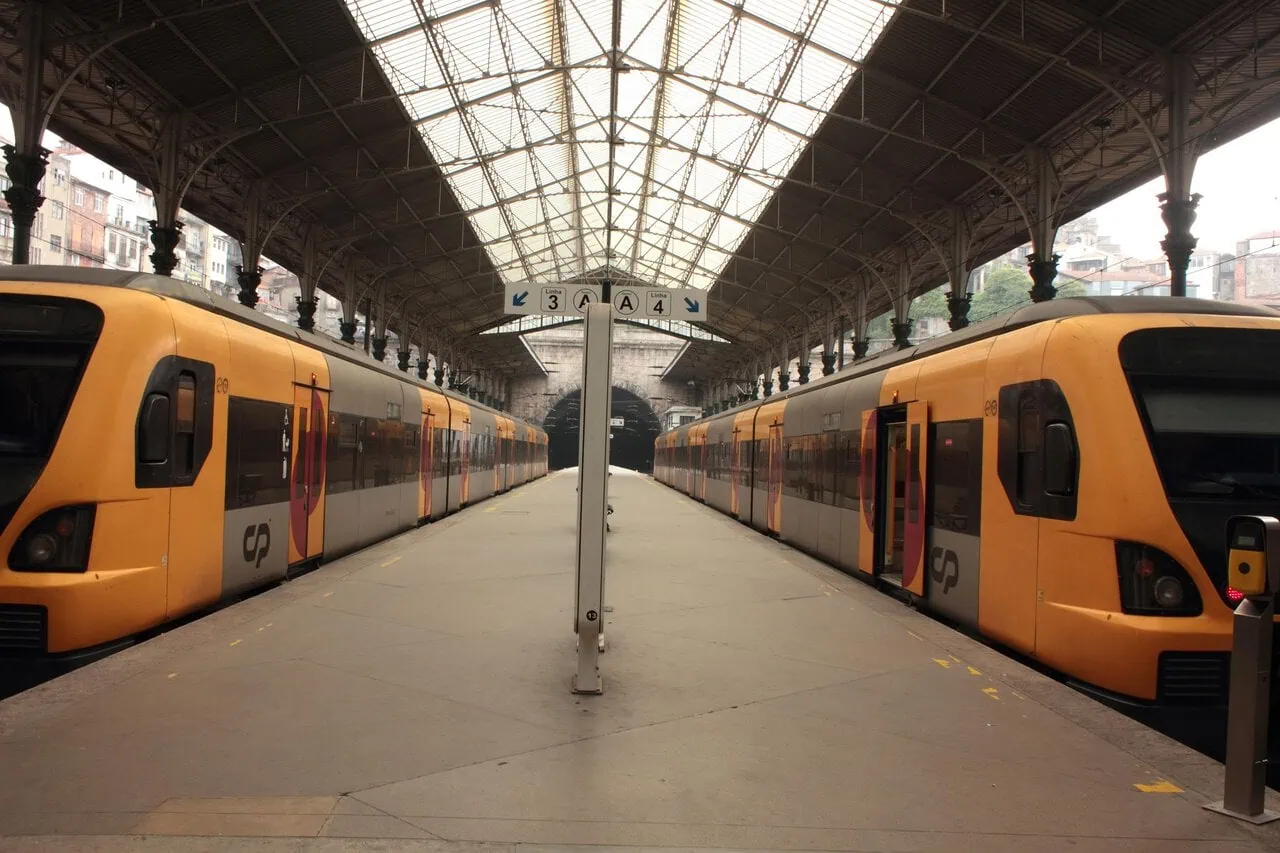 CP regional trains waiting at Porto São Bento Station in Portugal.