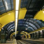 Modern Sofia Metro station with yellow and blue interior architecture on the route towards Arena Sofia.