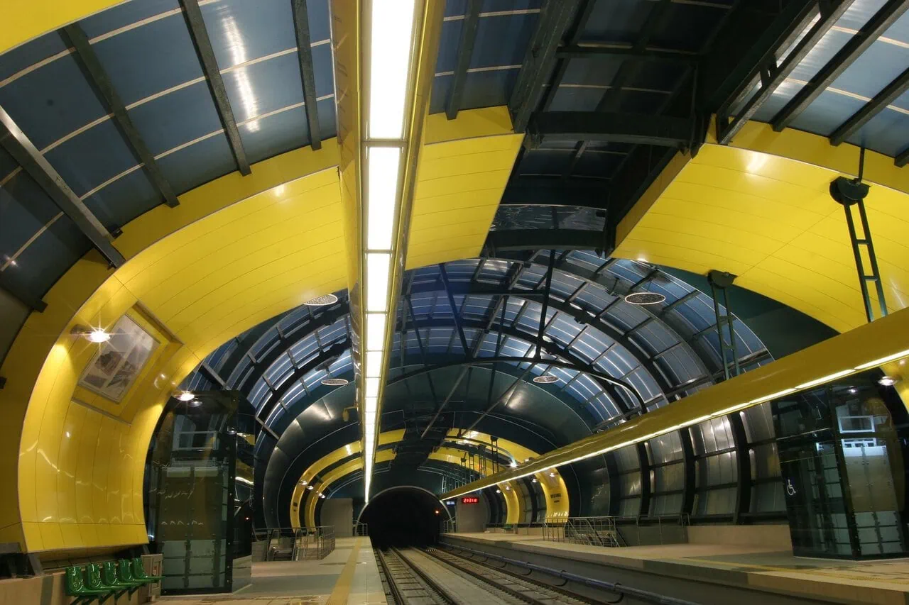Modern Sofia Metro station with yellow and blue interior architecture on the route towards Arena Sofia.