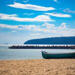 Sandy beach and small boat on Bulgaria's Black Sea coast near Varna.