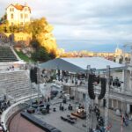 Ancient Roman Theatre of Plovdiv hosting an outdoor performance.