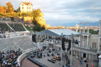 Ancient Roman Theatre of Plovdiv hosting an outdoor performance.