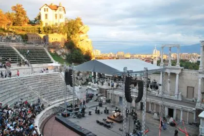 Ancient Roman Theatre of Plovdiv hosting an outdoor performance.