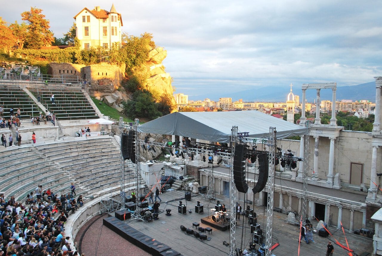 Ancient Roman Theatre of Plovdiv hosting an outdoor performance.